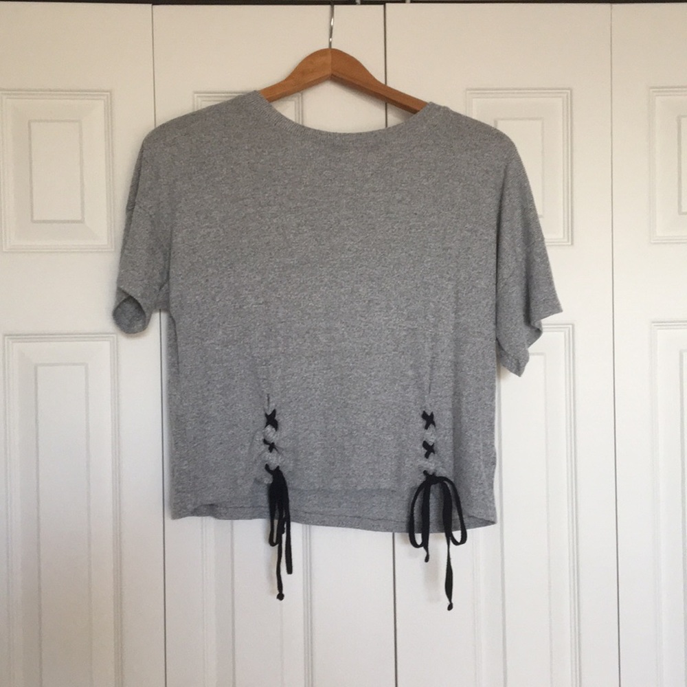 grey top with ties